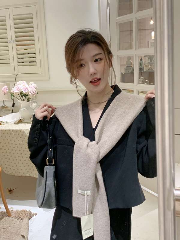 50代ファッション ゆったりウォーミーベスト