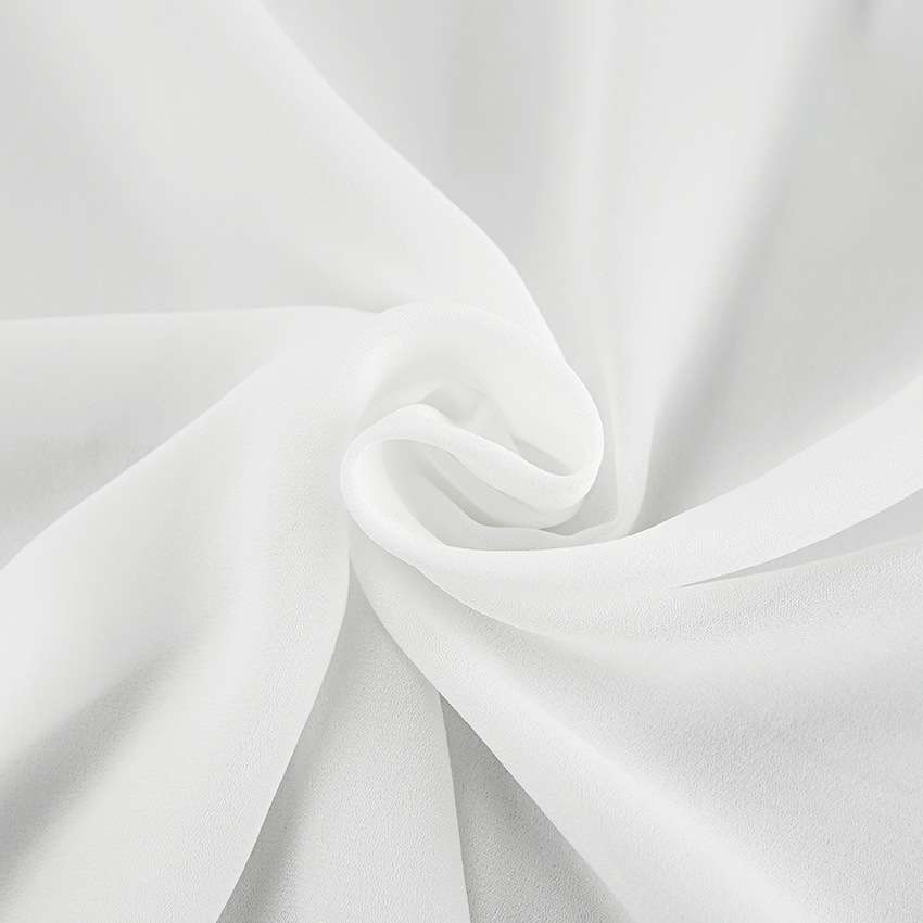 50代ファッション 優雅な蝶結びホルターネックブラウス