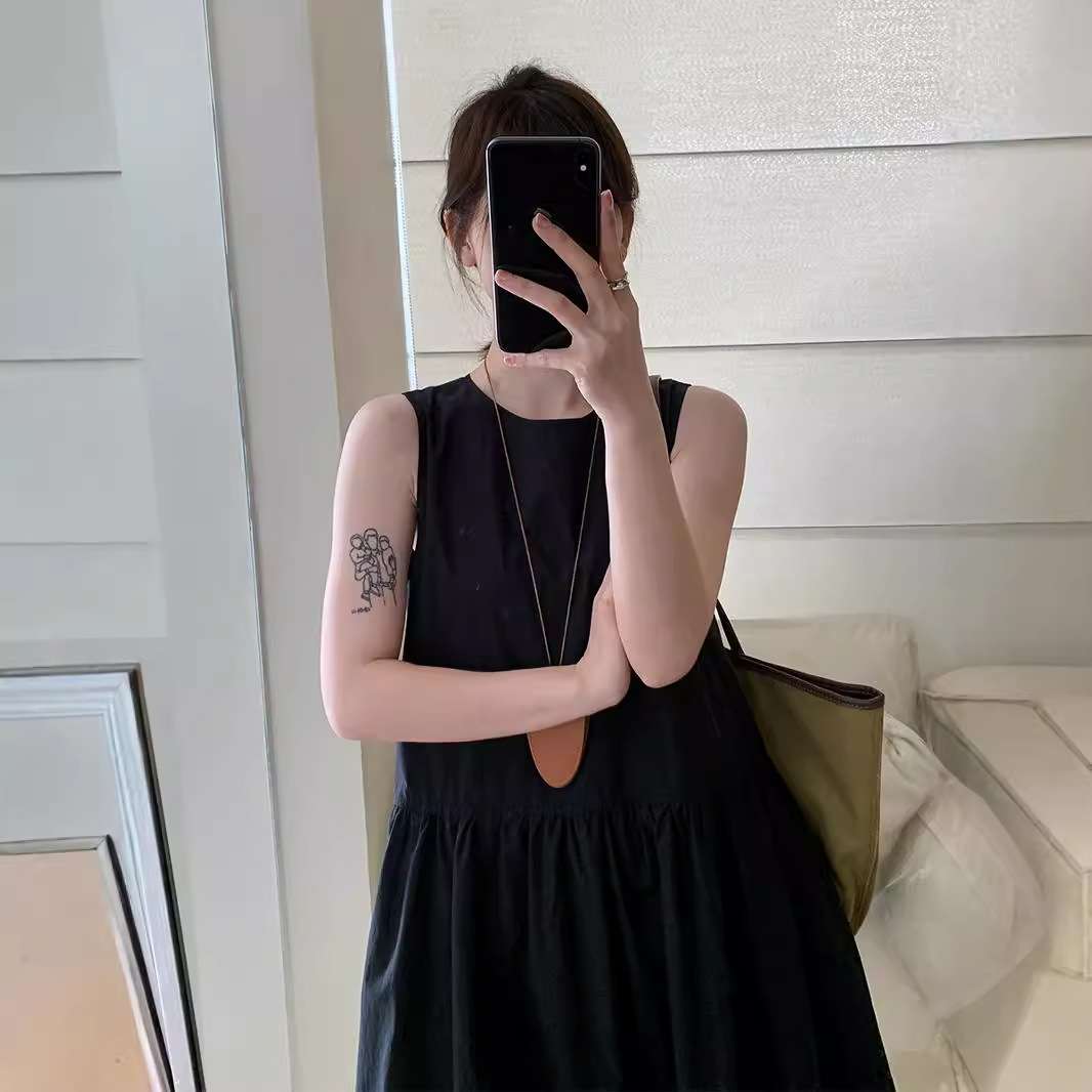 50代ファッション ゆったりシルエットの大人ワンピース